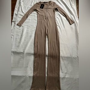 One piece jumpsuit light tan color